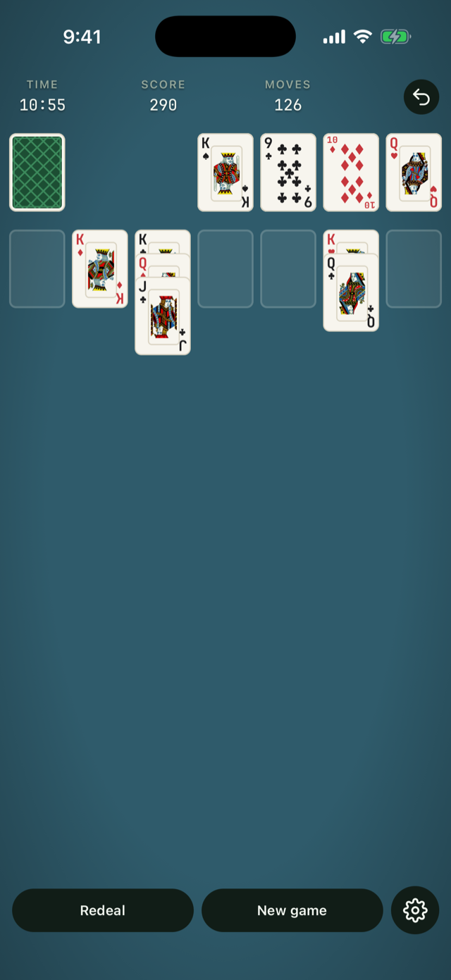 Nearly won: most cards home on the foundations, Classic deck on a custom teal table from the color picker
